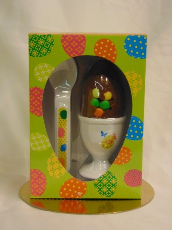 Eierdop met lepel en ei in melkchocolade Ontbijt-set Pasen met ei in melkchocolade