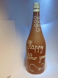 Grote champagnefles in melkchocolade VDV Chocolaterie