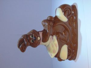 Sandy op scooter in melkchocolade