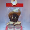 Piet hoofd in fondant of melkchocolade verpakt met caraques