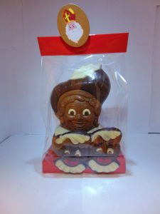 Piet hoofd in fondant of melkchocolade verpakt met caraques